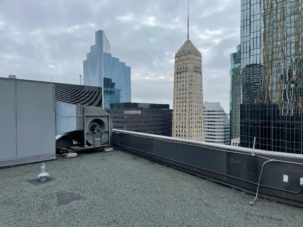 Finished roof and gutter run at dusk