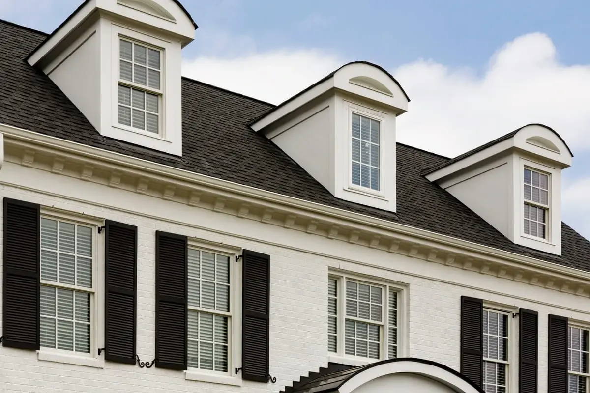 Replacement windows on a brick facade